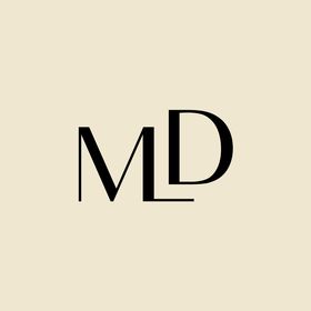 Black 'MD' logo on a beige background